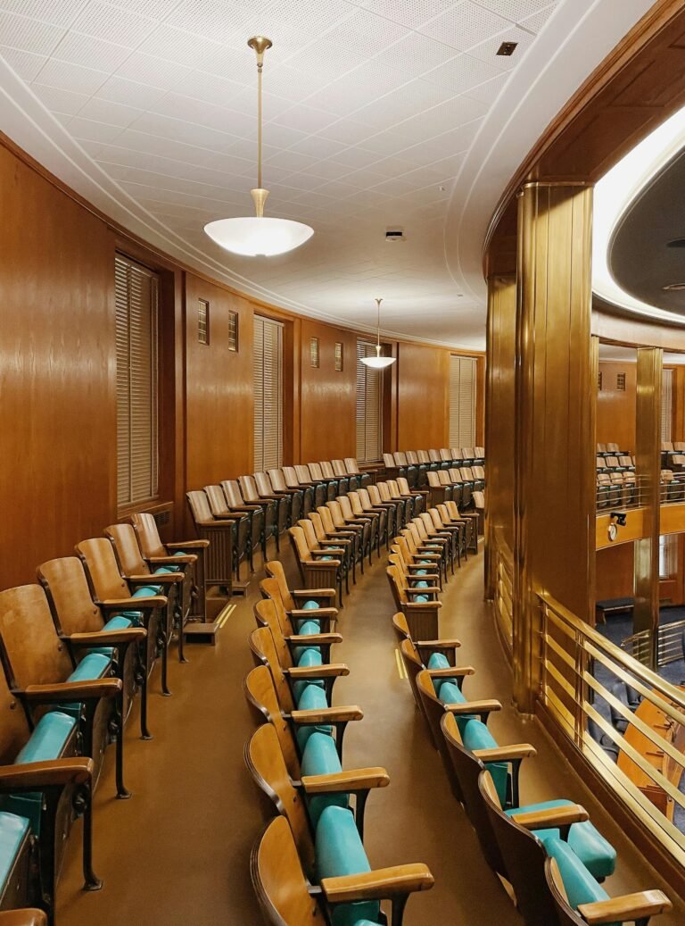 Captivating view of a government chamber with elegant wood paneling and seating arrangement in Bismarck, ND.